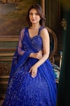 Studio22 By Pulkita Arora Bajaj_Blue Georgette, Net Sequins, Tassels, Opulent Tonal Hand Lehenga Set _at_Aza_Fashions