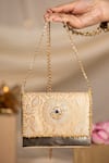 Shop 5elements Peach Beads, Pearls, Mirrors Aarna Brocade Paisley Motif Clutch Bag With Sling Online at Aza Fashions Shop_5elements_Peach Beads, Pearls, Mirrors Aarna Brocade Paisley Motif Clutch Bag With Sling _Online_at_Aza_Fashions