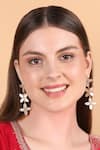 Shop Queens Jewels White Blossom Dangle Earrings at Aza Fashions Shop_Queens Jewels_White Blossom Dangle Earrings _at_Aza_Fashions