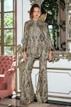 Buy Dash And Dot Black Polyester Metallic Thread, Sequins, Embroidery Round Gold Flared Pant Set at Aza Fashions Buy_Dash And Dot_Black Polyester Metallic Thread, Sequins, Embroidery Round Gold Flared Pant Set _at_Aza_Fashions