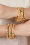 Buy_Smars Jewelry_Gold Plated Stones, Antique Floral Carved Embellished Bangles - Set Of 6 _at_Aza_Fashions