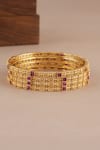 Shop_Smars Jewelry_Gold Plated Stones, Antique Ruby Studded Bangles - Set Of 4 _Online_at_Aza_Fashions