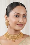 Buy_Smars Jewelry_Gold Plated Maa Laksmi Intricate Carved Antique Choker Set _at_Aza_Fashions