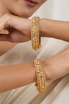 Shop_Smars Jewelry_Gold Plated Stones, Beads Antique Floral Carved Pair Of Bangles _Online_at_Aza_Fashions