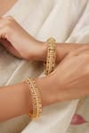 Buy Smars Jewelry Gold Plated Stones Antique Ruby Studded Pair Of Bangles Online at Aza Fashions Buy_Smars Jewelry_Gold Plated Stones Antique Ruby Studded Pair Of Bangles _Online_at_Aza_Fashions