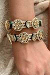 Buy_Saga Jewels_Green Pearls, Stones, Rhinestones Kundan And Embellished Pair Of Bangles _at_Aza_Fashions