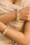 Buy_Saga Jewels_Gold Plated Beads, Stones, Pearls Ghunghroo Embellished Pair Of Temple Bangles _at_Aza_Fashions