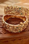 Shop_Saga Jewels_Gold Plated Beads, Stones, Pearls Temple Motif Carved Pair Of Bangles _at_Aza_Fashions