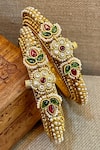 Shop_Saga Jewels_Multi Color Pearls, Stones Textured Pair Of Temple Bangles _at_Aza_Fashions