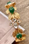 Shop_Saga Jewels_Gold Plated Stones Leaf Motif Embellished Bangle _at_Aza_Fashions