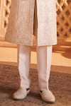Millionaire Cream Silk Zari, Pearls, Embroidery Floral Pattern Sherwani Set Online at Aza Fashions Millionaire_Cream Silk Zari, Pearls, Embroidery Floral Pattern Sherwani Set _Online_at_Aza_Fashions