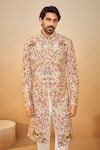 Millionaire_Cream Silk Embroidery, Zari, Metallic Thread Floral Sherwani Set _at_Aza_Fashions