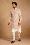 Shop_Millionaire_Orange Silk Zari, Pearls, Embroidery Floral Sherwani Set _Online_at_Aza_Fashions