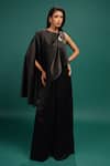 Buy Style Junkiie Black Polyester, Satin Beads, Sequins, Foil Ebony Spotted Draped Cape Jumpsuit at Aza Fashions Buy_Style Junkiie_Black Polyester, Satin Beads, Sequins, Foil Ebony Spotted Draped Cape Jumpsuit _at_Aza_Fashions