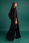 Shop Style Junkiie Black Polyester, Satin Beads, Sequins, Foil Ebony Spotted Draped Cape Jumpsuit at Aza Fashions Shop_Style Junkiie_Black Polyester, Satin Beads, Sequins, Foil Ebony Spotted Draped Cape Jumpsuit _at_Aza_Fashions