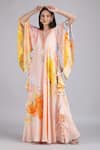 Buy_Mandira Wirk_Peach Crepe Embroidery, Tassels V-neck Floral Faux Print Kaftan Dress _at_Aza_Fashions
