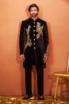 Buy Millionaire Black Velvet Zari, Embroidery And Tiki Sherwani Set at Aza Fashions Buy_Millionaire_Black Velvet Zari, Embroidery And Tiki Sherwani Set _at_Aza_Fashions