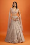 Shop_Seema Gujral_Beige Sequins, Embroidery V-neck Blouse And Lehenga Set _Online_at_Aza_Fashions