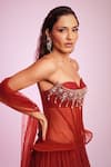 Buy Anshika Tak Label Red Net, Silk Organza Beads, Crystals, Gemstones Embellished Corset Lehenga Set Online at Aza Fashions Buy_Anshika Tak Label_Red Net, Silk Organza Beads, Crystals, Gemstones Embellished Corset Lehenga Set _Online_at_Aza_Fashions
