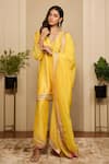 Neha Mehra_Yellow Chanderi Gota Patti, Zari, Embroidery, Piping V-neck Hand Kurta Set _at_Aza_Fashions