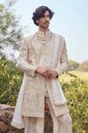 Mukti And Kavith Casa_Gold Silk Embroidery, Zari Mehr Heritage Sherwani Set _Online_at_Aza_Fashions