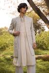 Mukti And Kavith Casa_Gold Chanderi Embroidery, Zari Heritage Weave Sherwani Set _Online_at_Aza_Fashions