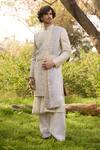 Shop_Mukti And Kavith Casa_Gold Chanderi Embroidery, Zari Heritage Weave Sherwani Set _at_Aza_Fashions
