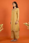 Shop_Naintara Bajaj_Yellow Satin, Silk Embroidery Round Neck Hand Straight Kurta Set _Online_at_Aza_Fashions