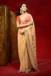 Azeera_Gold Net Embroidery, Sequins, Stones Work Saree With Unstitched Blouse Piece _at_Aza_Fashions