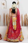 Shop_Monika Mathuria Datta_Yellow Chanderi, Net Embroidery, Metallic Thread, Gul Printed Lehenga Blouse Set _at_Aza_Fashions