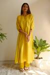 Juanita By Shubhda_Yellow Chanderi Split V-neck Pintuck Detail Kurta And Pant Set _at_Aza_Fashions