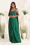 Buy_Meenagurnam_Emerald Green Net Sequins, Embroidery Sweetheart Embellished Blouse And Skirt Set _at_Aza_Fashions