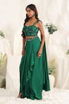 Meenagurnam_Emerald Green Net Sequins, Embroidery Sweetheart Embellished Blouse And Skirt Set _Online_at_Aza_Fashions