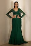 Buy Shloka Khialani Emerald Green Georgette, Net Maha Fishtail Pre-draped Saree And Corset Blouse at Aza Fashions Buy_Shloka Khialani_Emerald Green Georgette, Net Maha Fishtail Pre-draped Saree And Corset Blouse _at_Aza_Fashions