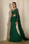 Shop Shloka Khialani Emerald Green Georgette, Net Maha Fishtail Pre-draped Saree And Corset Blouse at Aza Fashions Shop_Shloka Khialani_Emerald Green Georgette, Net Maha Fishtail Pre-draped Saree And Corset Blouse _at_Aza_Fashions