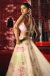 Shop_Papa Dont Preach_Ivory Tulle Sequins, Embroidery, Dancing With Moons Hand Lehenga And Blouse Set _at_Aza_Fashions