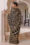 Shop Geroo Jaipur Black Modal, Silk Zari Checks Bandhani Saree With Unstitched Blouse Piece at Aza Fashions Shop_Geroo Jaipur_Black Modal, Silk Zari Checks Bandhani Saree With Unstitched Blouse Piece _at_Aza_Fashions