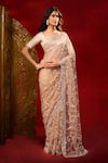 Azeera_Rose Gold Net Embroidery, Metallic Thread Saree With Unstitched Blouse Piece _at_Aza_Fashions