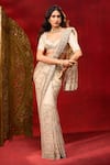 Buy Azeera White Net Embroidery, Sequins, Zari Floral Saree With Unstitched Blouse Piece at Aza Fashions Buy_Azeera_White Net Embroidery, Sequins, Zari Floral Saree With Unstitched Blouse Piece _at_Aza_Fashions