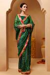 Shop_Geroo Jaipur_Green Silk Zari Bandhani Pattern Pre-draped Saree With Unstitched Blouse Piece 
