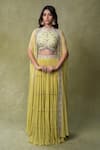 Buy_AMRIN KHAN_Yellow Georgette, Silk Embroidery, Mirrors, Stones Tiered Lehenga And Blouse Set _at_Aza_Fashions
