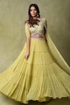 AMRIN KHAN_Yellow Georgette, Silk Embroidery, Mirrors, Stones Tiered Lehenga And Blouse Set _Online_at_Aza_Fashions