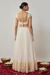 Shop Renee label Ivory Net Embroidery, Sequins, Fringe Round Neck, Aadhya Thread Lehenga Set at Aza Fashions Shop_Renee label_Ivory Net Embroidery, Sequins, Fringe Round Neck, Aadhya Thread Lehenga Set _at_Aza_Fashions