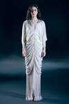 Buy_Nirmooha_Ivory Lycra Embroidery, Tassels V-neck Selene Aura Gown _at_Aza_Fashions