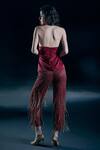 Shop_Nirmooha_Red Satin, Chiffon, Lycra Beads, Tassels Ignis Twisted Top And Sheer Pant Set _at_Aza_Fashions