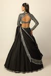 Shop_Vvani by vani vats_Black Georgette, Organza Mirrors, Beads, Heavy Embroidered Blouse Lehenga Set _at_Aza_Fashions