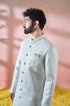 Arihant Rai Sinha Green Silk, Polyester, Viscose Embroidery, Sequins Thread Sherwani And Pant Set Arihant Rai Sinha_Green Silk, Polyester, Viscose Embroidery, Sequins Thread Sherwani And Pant Set