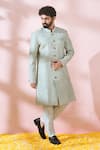 Shop Arihant Rai Sinha Green Silk, Polyester, Viscose Embroidery, Sequins, Metallic Sherwani And Pant Shop_Arihant Rai Sinha_Green Silk, Polyester, Viscose Embroidery, Sequins, Metallic Sherwani And Pant