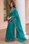 Vaayu_Green Muslin, Cotton Tassels V-neck Teal Bloom Saree With Blouse _at_Aza_Fashions