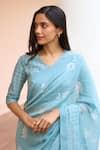Vaayu_Blue Muslin, Cotton V-neck Powder Saree With Blouse _Online_at_Aza_Fashions